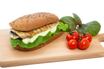 Sandwich on a chopping board.