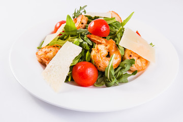 Caesar salad with tiger shrimps, parmesan and tomato 