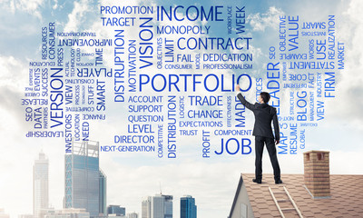 Young businessman standing on house roof and writing leadership 
