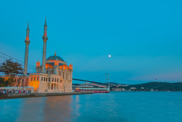 Fototapeta na wymiar Ortakoy Mecidiye mosque and the Bosphorus bridge, Istanbul, Turkey