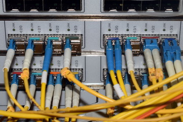 the central panel of the router, optical patchcords, media conve
