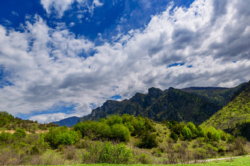 Fototapeta na wymiar Amazing mountain landscape with dramatic clouds, Armenia