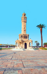 Fototapeta na wymiar Clocktower and palms in Izmir.