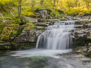 Obraz na płótnie Canvas Autumn waterfall