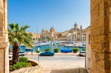 Street and Marina in Senglea, one of the Three Cities in the Grand Harbour area of Malta. - obrazy, fototapety, plakaty