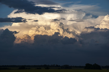 Stormy clouds, sunset..Storm is coming. Storm clouds on the horizon, the beginning of the storm....