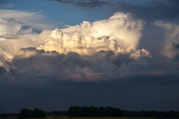 Stormy clouds, sunset..Storm is coming. Storm clouds on the horizon, the beginning of the storm. sunset.