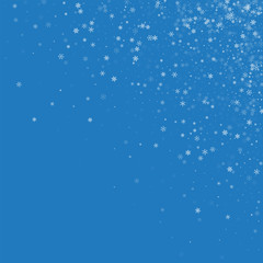 Beautiful snowfall. Scattered top right corner on blue background. Vector illustration.
