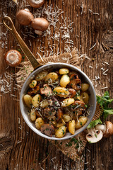 Gnocchi with brown mushrooms, top view