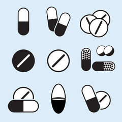 Medical pills icons in flat style. Set of stylized medicament pill, tablet and capsule symbols isolated on blue background. Medication illustration in EPS8 vector format.