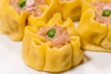 Dumplings of dough stuffed with fish