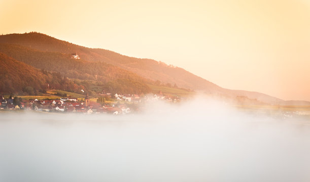 Village with clouds at dawn, Pfalz, Germany