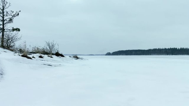 Time-lapse of ice sailing with a kitewing at a frozen lake