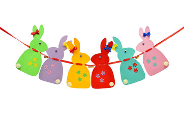 Festive, paper rabbits isolated on a white background. Symbols and attributes of the holiday.