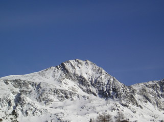 Mountain peak with snow