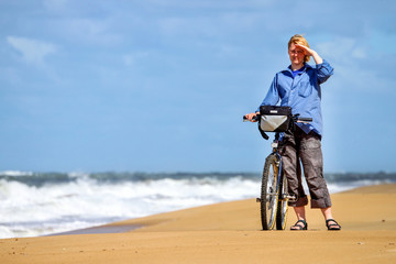 Fototapeta premium A girl with a bicycle