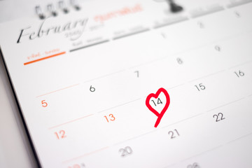 Calendar page with the red hearts on February 14 of Saint Valentines day