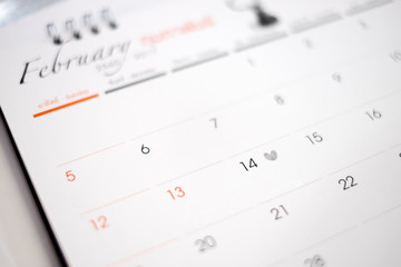 Calendar page with draw heart on February 14 of Saint Valentines day