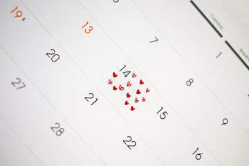 Calendar page with the red hearts on February 14 of Saint Valentines day