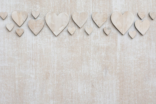 Background with wooden hearts