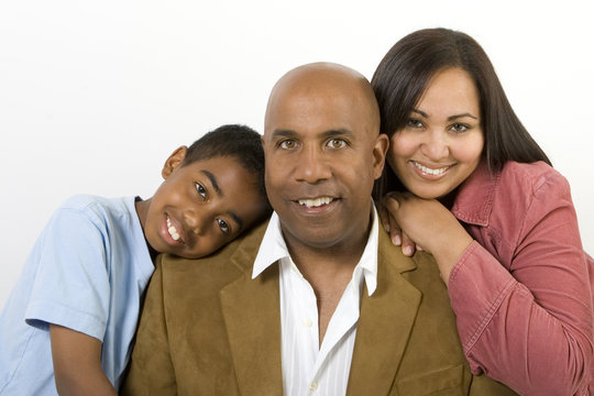 African American Multicultural Family Reading The Bible.