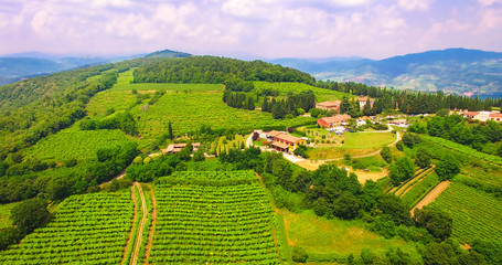 Fototapeta premium Aerial view of Tenuta Coffele, an old farmhouse in the hills aro