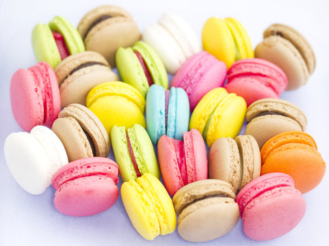 Colorful macarons isolated on white background