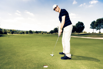 Golf Player Putting