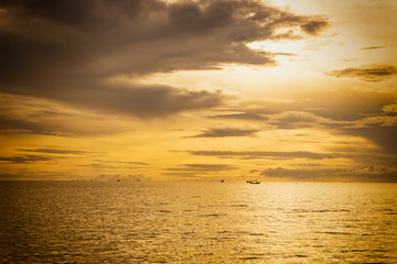 abstract sunset scene in the sea with golden vintage filter - can use to display or montage on product