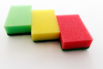 Dishwashing sponges on a white background