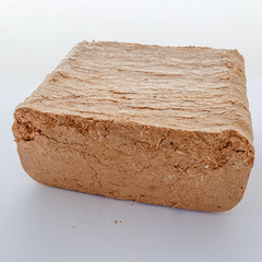 Wood briquettes isolated on white background