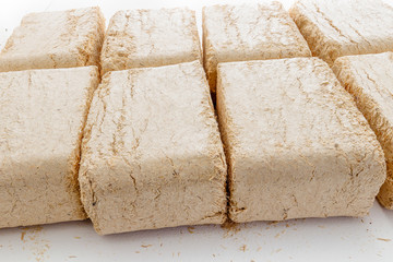 Wood briquettes isolated on white background