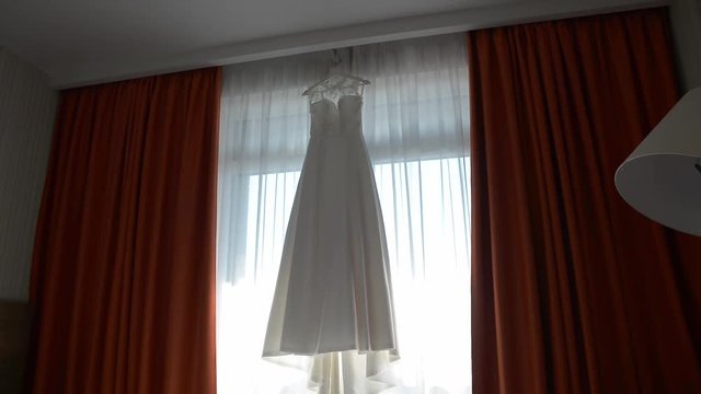 wedding dresses in a hotel room