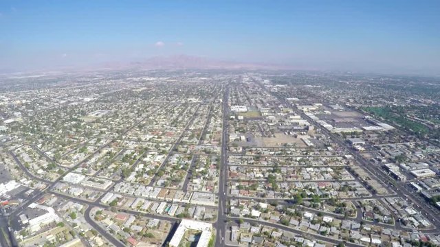Aerial zooming timelapse video of the city suburbs, filmed from the stratosphere tower, in Las vegas, Nevada, in United states of America