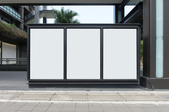 Large blank billboard on a street wall,  banners with room to add your own text