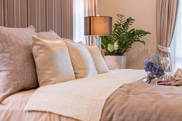 Bed maid-up with clean white pillows and bed sheets in beauty ro