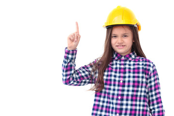 Little girl with a yellow helmet pointing finger up isolate on w