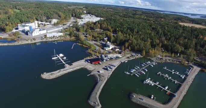 Cinema 4k aerial flight view orbiting around Forby harbor, in the finnish archipelago at Isoluoto, Varsinais-Suomi, Finland