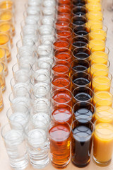 Great number of soft drinks ready for a banquet, shot from above.