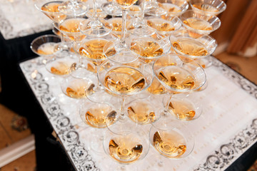 Champagne pyramid on event, party or banquet.