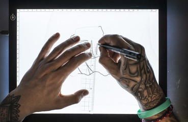 Tattoo master drawing sketch