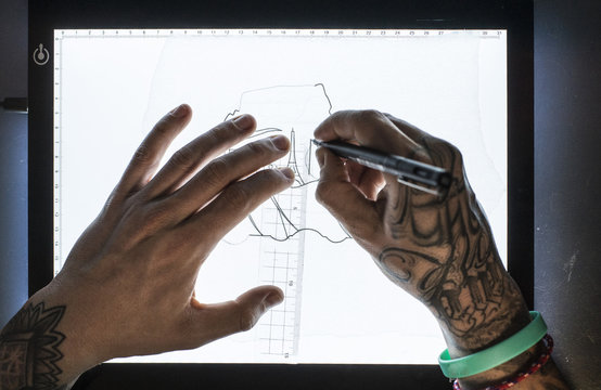 Tattoo master drawing sketch