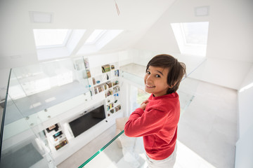 Fototapeta na wymiar Child inside interior of modern home