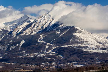 Fototapeta na wymiar Petite and Grande Autane mountain peaks covered in winter snow. Saint Leger les Melezes, Champsaur, Hautes Alpes, Southern French Alps, France