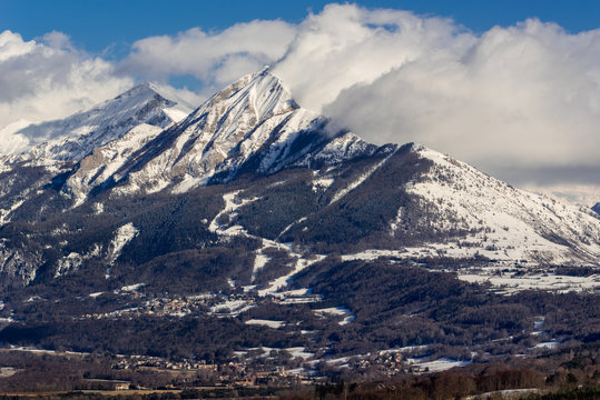 Petite and Grande Autane mountain peaks covered in winter snow. Saint Leger les Melezes, Champsaur, Hautes Alpes, Southern French Alps, France