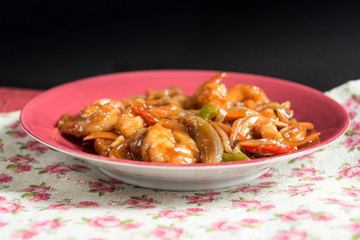 wok fried chicken stir fry with sweet peppers and chinese vegeta