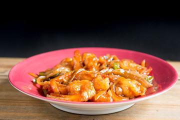 wok fried chicken stir fry with sweet peppers and chinese vegeta