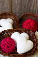 Arrangement of gingerbread hearts in a wicker basket