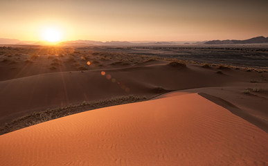 Fototapeta na wymiar Sunrise in the Namibian deserts of West Africa