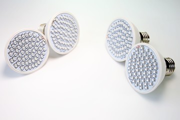 AC LED lamp on white board background.